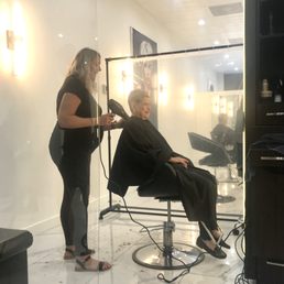 Maskless Stylish and Client (both supposedly have "medical conditions")