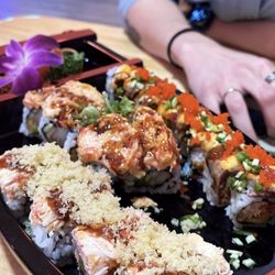 Tsukiyomi Sushi - 54. Fuji Volcano Roll. And I don't remember the names for the other rolls.