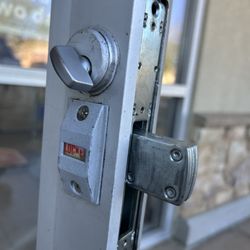Lock Pros - Image on the exterior side of the FedEx door with new latch installed