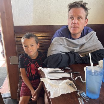 The Beach Street Cafe - Waiting with his uncle. - Breakfast & Brunch Near Me - Watsonville, California The Beach Street Cafe - Waiting with his uncle. - Breakfast & Brunch Near Me - Watsonville, California