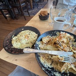 The chilaquiles fiasco: cheese removed to the left and what I left on my plate inedible to the right.