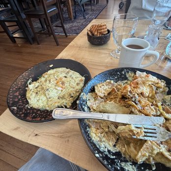 Brunch & - The chilaquiles fiasco: cheese removed to the left and what I left on my plate inedible to the right. - Breakfast & Brunch Near Me - Estes Park, Colorado