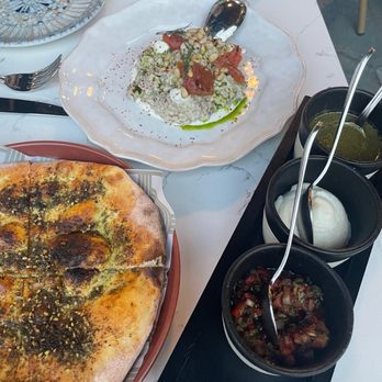 Sifr - Zaatar manakish with the accompaniments & the Tunisian eggplant (one of my favorites of the night) - Middle Eastern Near Me - Chicago, Illinois