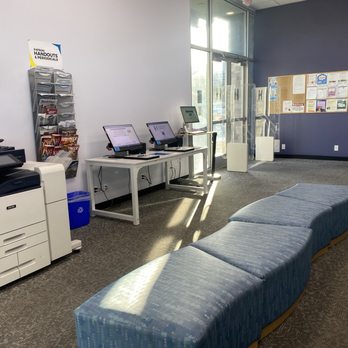 West Henderson Library - When you walk in, you'll see the printer and check out and customer service sitting down if you need help - Libraries Near Me - Henderson, Nevada
