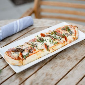 West & Co - a plate of pizza on a table - Breakfast & Brunch Near Me - Culver City, California West & Co - a plate of pizza on a table - Breakfast & Brunch Near Me - Culver City, California