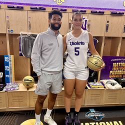 Coach Josh with his trainee Diana at a recruiting visit for NYU