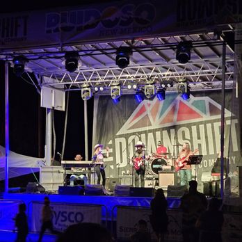 Downshift Brewing - a band performing on stage - Pizza Near Me - Ruidoso, New Mexico