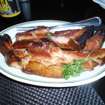 Manny's Steakhouse - Extra thick Wisconsin bacon - the most popular appetizer on the menu. - Steakhouses Near Me - Minneapolis, Minnesota