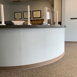 Kc Schneider DDS - Shields are set up due to Covid. They take your temperature when you come in for your appt.