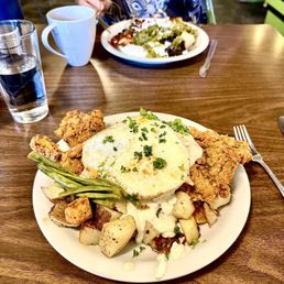 Chicken fried rib eye special (foreground) and huevos rancheros