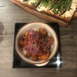 Rubirosa Cucina & Bar - Cauliflower bites. Breading was perfection, cabbage slaw and flavor was perfect blend of spicy tangy deliciousness.