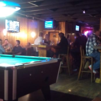 Tom's Peacock Bar & Grill - Part of the main floor seating - Bars Near Me - Corvallis, Oregon