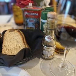 Warm sour dough bread. Balsamic vinegar and olive oil.