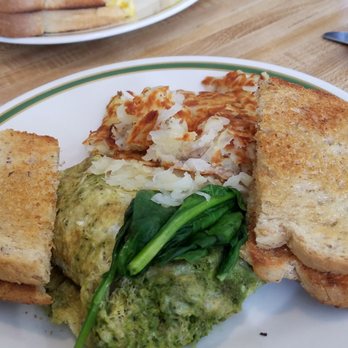 Flury's Cafe - Pesto and fresh spinach with mozzarella cheese omelette. Served with rye toast and hashbrowns so delicious great choice - Burgers Near Me - Cuyahoga Falls, Ohio Flury's Cafe - Pesto and fresh spinach with mozzarella cheese omelette. Served with rye toast and hashbrowns so delicious great choice - Burgers Near Me - Cuyahoga Falls, Ohio