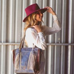 Roberta Weissburg Leathers - Handcrafted leather bag with woven details we love
