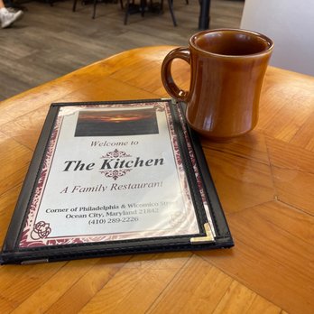 The Kitchen - a cup of coffee and a menu on a table - Breakfast & Brunch Near Me - Ocean City, Maryland