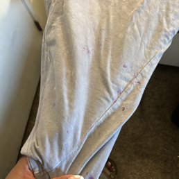 A few examples of clothing that is stained