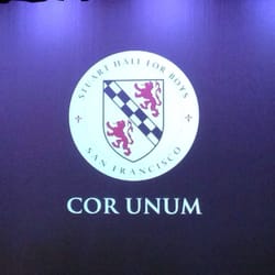 Schools of the Sacred Heart - SHB Crest with 2012-2013 school motto "Cor Unum," meaning "one heart".