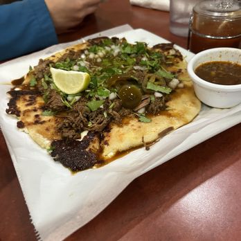 El Asador Restaurant - The large pupusa birria - Salvadoran Near Me - Fredericksburg, Virginia