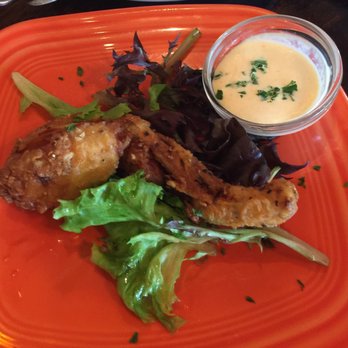 Santiago's Bodega - 1 frog leg left on the plate at Santiago's Bodega. - Tapas Bars Near Me - Key West, Florida Santiago's Bodega - 1 frog leg left on the plate at Santiago's Bodega. - Tapas Bars Near Me - Key West, Florida