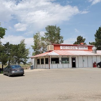 George's Drive Inn - a parking lot with cars parked in front of it - Burgers Near Me - Walsenburg, Colorado George's Drive Inn - a parking lot with cars parked in front of it - Burgers Near Me - Walsenburg, Colorado