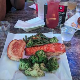 Salmon Dinner with green beans and broccoli. Salmon Dinner with green beans and broccoli.