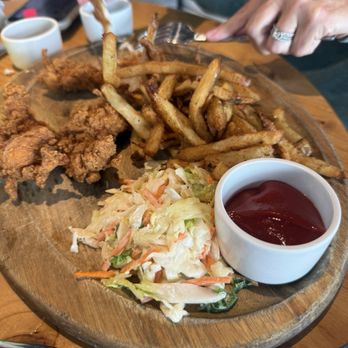 Kitchen Social - Perfectly breaded and crunchy chicken fingers with hot honey sauce. Crushed it. - Cocktail Bars Near Me - Columbus, Ohio