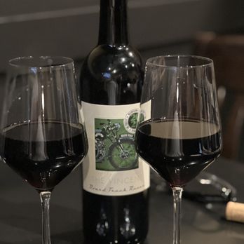 Davine Whiskey & Wine Bar - two glasses of wine and a bottle of wine - New American Near Me - Maple Valley, Washington Davine Whiskey & Wine Bar - two glasses of wine and a bottle of wine - New American Near Me - Maple Valley, Washington