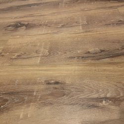 Flooring 101 - Thousand Oaks - Horrible "distressing " on flooring that is not labeled as distressed.