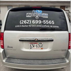 YM Locksmith - YM Locksmith's mobile service van, parked at Barker Road, Brookfield, WI, showcases our 24/7 locksmith expertise...