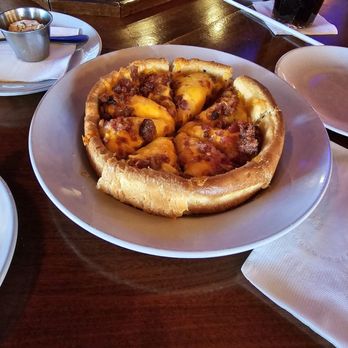 Uno Pizzeria & Grill - Pizza Skins UNO's signature deep dish pizza crust filled with mashed red bliss potatoes and topped with bacon and cheddar. - Pizza Near Me - Bensalem, Pennsylvania Uno Pizzeria & Grill - Pizza Skins UNO's signature deep dish pizza crust filled with mashed red bliss potatoes and topped with bacon and cheddar. - Pizza Near Me - Bensalem, Pennsylvania