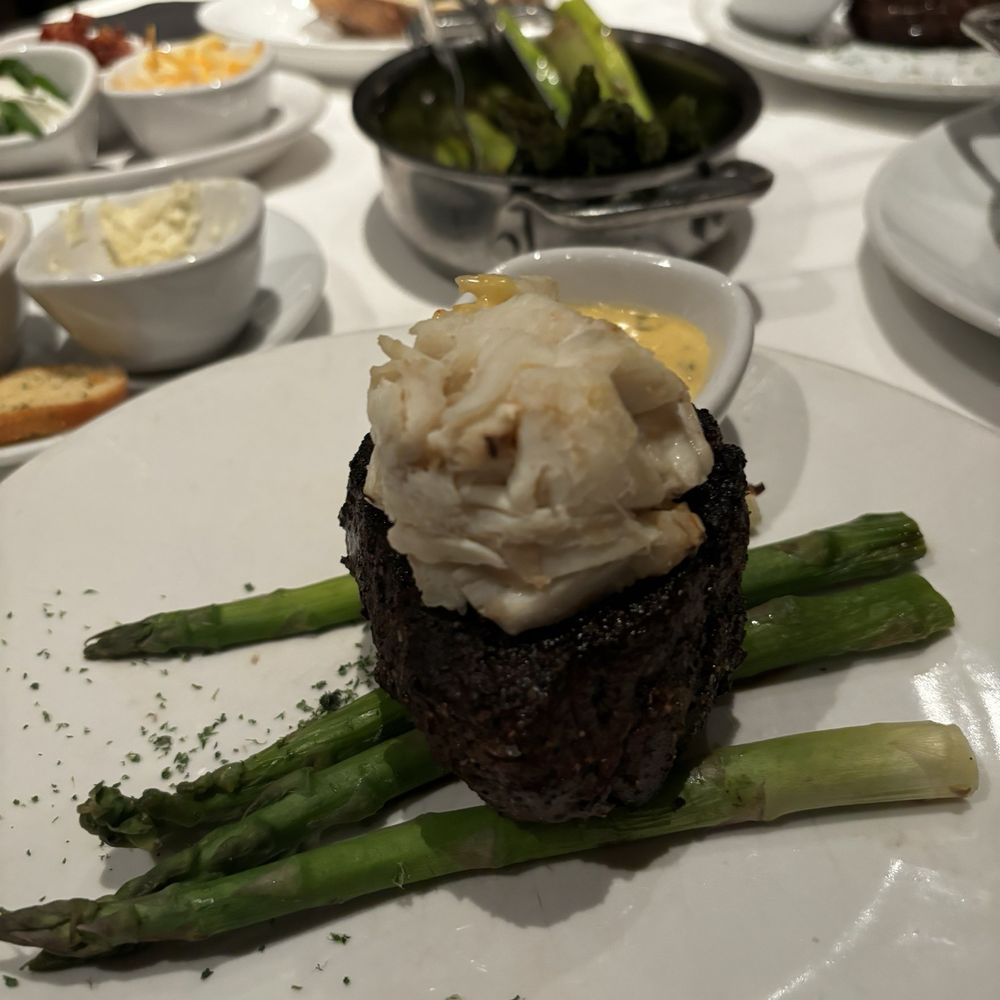 Fleming’s Prime Steakhouse & Wine Bar - Petite Filet Mignon with Oscar-Style Jumbo Lump Crabmeat - Steakhouses Near Me - Mclean, Virginia Fleming’s Prime Steakhouse & Wine Bar - Petite Filet Mignon with Oscar-Style Jumbo Lump Crabmeat - Steakhouses Near Me - Mclean, Virginia