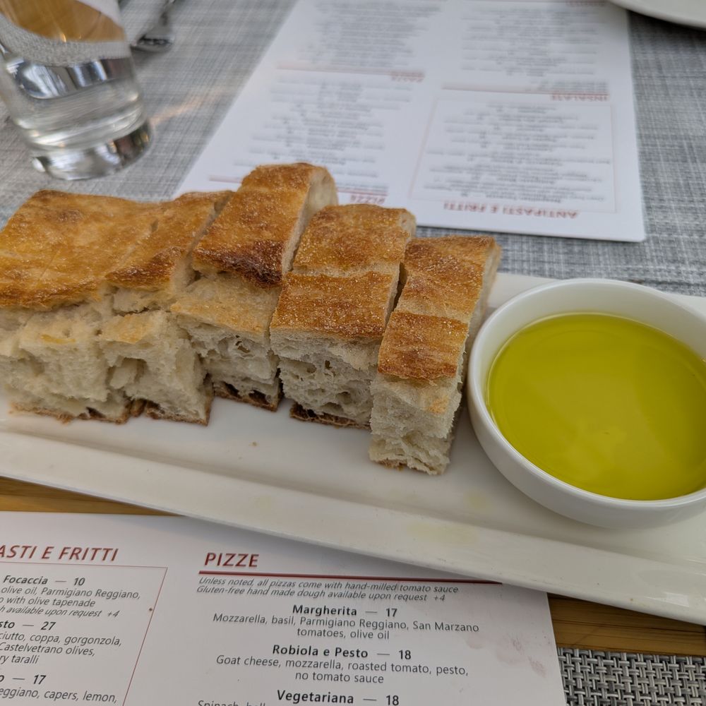 Novo Cucina - Ciabatta and olive oil. Bread service. Complimentary. - Pizza Near Me - Dunwoody, Georgia Novo Cucina - Ciabatta and olive oil. Bread service. Complimentary. - Pizza Near Me - Dunwoody, Georgia