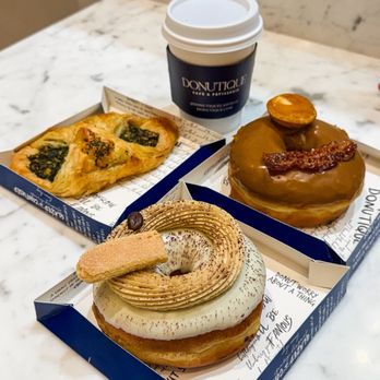 Donutique - Back left is the spinach & cheese, top right is maple bacon, front is tiramisus - Coffee & Tea Near Me - Las Vegas, Nevada Donutique - Back left is the spinach & cheese, top right is maple bacon, front is tiramisus - Coffee & Tea Near Me - Las Vegas, Nevada