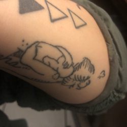 Seductive Ink - The hand in the tattoo is messed up
