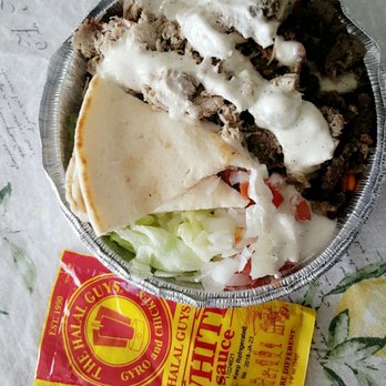 The Halal Guys - small combo platter with packets of white sauce! - Halal Near Me - Glendale, California