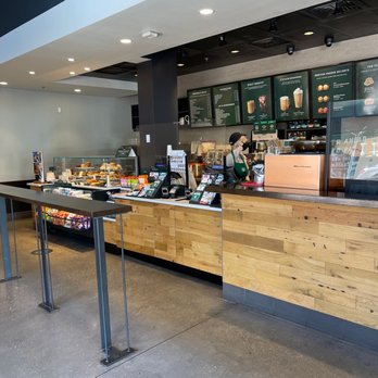 Starbucks - a coffee shop with a long counter - Coffee & Tea Near Me - Fort Myers, Florida Starbucks - a coffee shop with a long counter - Coffee & Tea Near Me - Fort Myers, Florida