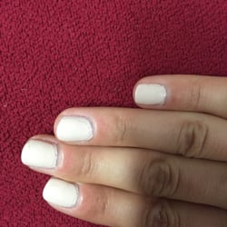 Colorful Nails - This is two coats and a top coat. The top coat doesn't even cover the whole nail and you can tell
