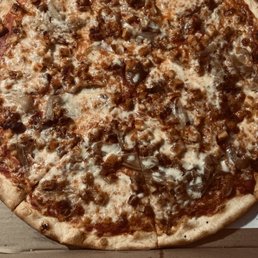 Margherita Pizza with extra cheese, bacon, breaded chicken, and sautéed onions made well done.   Amazing!!!