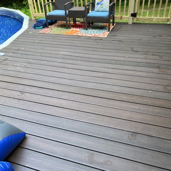 Hemlock Contracting - View of new deck from bottom of stairs - Roofing Near Me