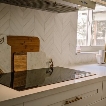 Gallego Premium Services - a kitchen with white cabinets and white countertops - Handyman Near Me Gallego Premium Services - a kitchen with white cabinets and white countertops - Handyman Near Me