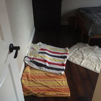 Paragon Equities - Leaks, trying to protect floor, bucket - Property Management Near Me - Long Beach, California