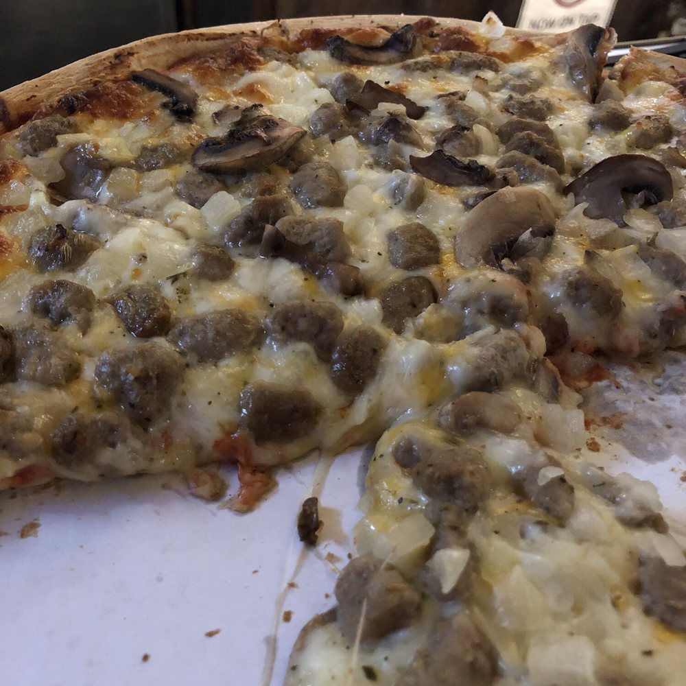 Kims 5 Corners - a half eaten pizza - American Near Me - Sheboygan Falls, Wisconsin Kims 5 Corners - a half eaten pizza - American Near Me - Sheboygan Falls, Wisconsin