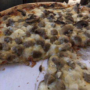 Kims 5 Corners - a half eaten pizza - American Near Me - Sheboygan Falls, Wisconsin