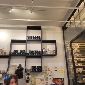 Dessert Oasis Coffee Roasters - Wall of mugs - Coffee Roasteries Near Me - Royal Oak, Michigan Dessert Oasis Coffee Roasters - Wall of mugs - Coffee Roasteries Near Me - Royal Oak, Michigan