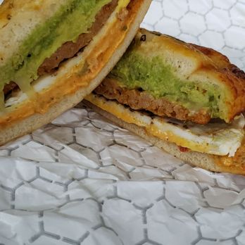 Einstein Bros. Bagels - Chorizo Sunrise. Avocado,  chorizo patty, egg, & some spicy sauce. Lol Good... just spicy. - Bagels Near Me - Mansfield, Texas