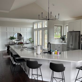Robles Remodeling - Huge wrap-around kitchen island with quartz counters - General Contractors Near Me