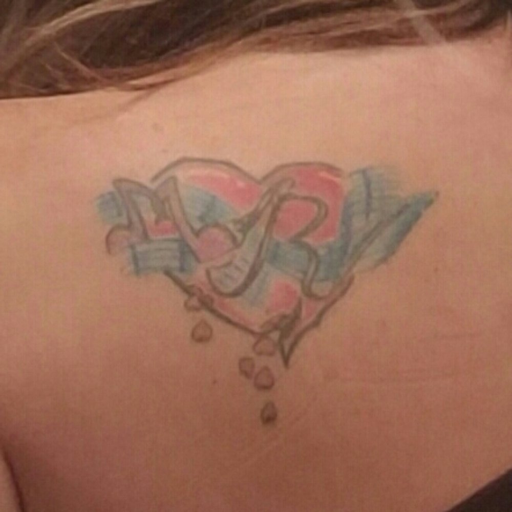 360 Blues & Tattoos - The old tattoo that they covered up (see previous photo of the butterfly) - Tattoo Near Me - Arlington, Texas 360 Blues & Tattoos - The old tattoo that they covered up (see previous photo of the butterfly) - Tattoo Near Me - Arlington, Texas
