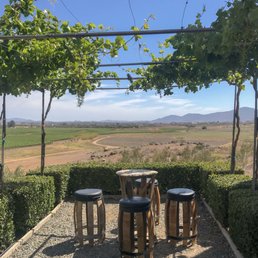 The best place on the property for a tasting. Seats up to 4 and it feels private (a great place for a proposal). The best place on the property for a tasting. Seats up to 4 and it feels private (a great place for a proposal).