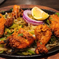 Spice Indian Cuisine - TANDOORI
Marinated in a rich blend of traditional Indian spices and house made yogurt, then slow-cooked to perfection.